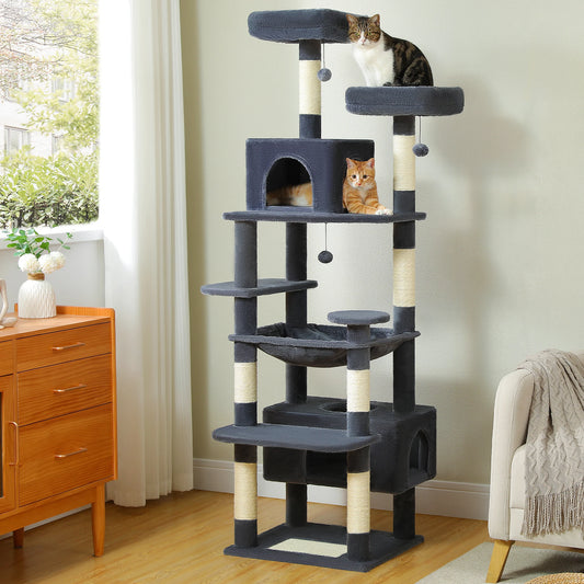 Deep grey 72 inch cat tree with two condos and sisal posts in a living room, two cats resting on it