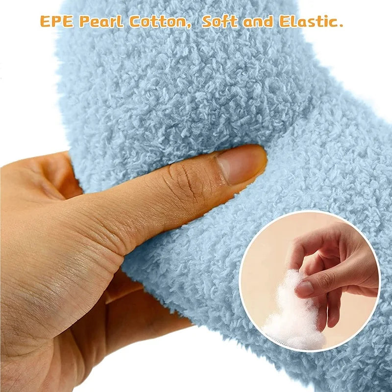 Hand pressing the pillow to show the soft pearl cotton filling inside