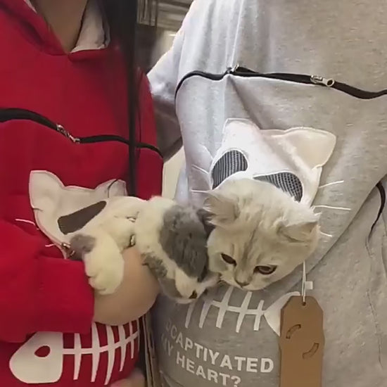 Cozy cat hoodie with a breathable pouch that helps anxious cats feel safe and connected while staying close to their owner.